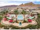 Large community pool with multiple areas for relaxation at 19 Via Visione # 204, Henderson, NV 89011