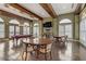 Game room with pool table, seating, and hardwood floors at 19 Via Visione # 204, Henderson, NV 89011