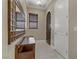 Bright and spacious entryway with tile flooring and a console table with mirror at 19 Via Visione # 204, Henderson, NV 89011