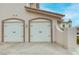 Two-car garage with automatic door openers at 19 Via Visione # 204, Henderson, NV 89011