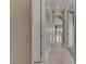 Long hallway with tile floors leading to other rooms at 19 Via Visione # 204, Henderson, NV 89011