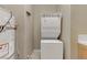 Convenient laundry area with stackable washer and dryer at 19 Via Visione # 204, Henderson, NV 89011