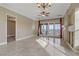 Bright living room with fireplace and access to spacious balcony at 19 Via Visione # 204, Henderson, NV 89011