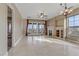 Bright and spacious living room with fireplace and access to balcony at 19 Via Visione # 204, Henderson, NV 89011