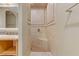 Elegant shower with tiled walls and built-in seat at 19 Via Visione # 204, Henderson, NV 89011