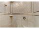Large shower with diamond patterned tile at 19 Via Visione # 204, Henderson, NV 89011