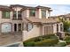 Mediterranean-style townhouse with double garage and landscaping at 19 Via Visione # 204, Henderson, NV 89011