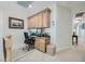 Upstairs office features built-in cabinetry and hardwood floors at 2448 Granada Bluff Ct, Las Vegas, NV 89135