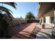 Landscaped backyard with a patio, and rock features at 3390 Syvella Ct, Las Vegas, NV 89117