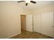 Bedroom with ceiling fan, double doors to closets at 3390 Syvella Ct, Las Vegas, NV 89117