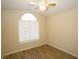 Bedroom with vaulted ceiling and large window with blinds at 3390 Syvella Ct, Las Vegas, NV 89117