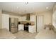 Spacious kitchen featuring stainless steel appliances and granite countertops at 3390 Syvella Ct, Las Vegas, NV 89117