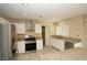 Granite countertops and stainless steel appliances in this kitchen at 3390 Syvella Ct, Las Vegas, NV 89117