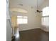 Spacious living room with high ceilings and dark hardwood floors at 3390 Syvella Ct, Las Vegas, NV 89117