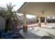 Covered patio, brick columns, and view of backyard at 3390 Syvella Ct, Las Vegas, NV 89117