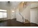 Elegant staircase with white railings leading to the upper level of the home at 3390 Syvella Ct, Las Vegas, NV 89117