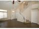 Elegant staircase with white railings leading to the upper level of the home at 3390 Syvella Ct, Las Vegas, NV 89117