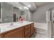 Double vanity bathroom with a soaking tub and shower at 3975 N Hualapai Way # 266, Las Vegas, NV 89129
