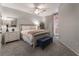 Spacious bedroom with plush bedding and access to balcony at 3975 N Hualapai Way # 266, Las Vegas, NV 89129