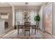 Bright dining room featuring a chandelier and hardwood floors at 3975 N Hualapai Way # 266, Las Vegas, NV 89129