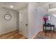 Clean and bright hallway with hardwood floors and a simple, modern design at 3975 N Hualapai Way # 266, Las Vegas, NV 89129