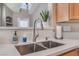 Modern double sink with sleek faucet and stone countertop at 3975 N Hualapai Way # 266, Las Vegas, NV 89129