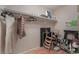 Convenient laundry room with washer, dryer, and storage shelves at 3975 N Hualapai Way # 266, Las Vegas, NV 89129