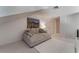 Spacious loft area with a comfy couch and large artwork at 3975 N Hualapai Way # 266, Las Vegas, NV 89129