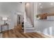 Elegant curved staircase leading to upper level at 3975 N Hualapai Way # 266, Las Vegas, NV 89129