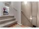 Modern staircase with a simple design, featuring wood flooring and a neutral color palette at 3975 N Hualapai Way # 266, Las Vegas, NV 89129