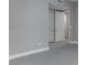 A carpeted bedroom with white baseboards and gray walls at 4269 Solace St # 0, Las Vegas, NV 89135