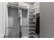 Open walk-in closet with shelves and hanging rods at 4269 Solace St # 0, Las Vegas, NV 89135