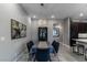 Dining room with elegant chandelier and seating for six at 4269 Solace St # 0, Las Vegas, NV 89135