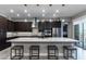 Contemporary kitchen featuring a large island, stainless steel appliances, and pendant lighting at 4269 Solace St # 0, Las Vegas, NV 89135