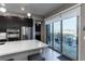 Bright modern kitchen with stainless steel appliances and access to outdoor balcony at 4269 Solace St # 0, Las Vegas, NV 89135