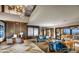 Elegant living room with soaring ceilings, custom details, and comfortable seating at 4269 Solace St # 0, Las Vegas, NV 89135