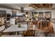 Open-concept living room and kitchen area with modern furnishings and stylish design at 4269 Solace St # 0, Las Vegas, NV 89135