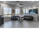 Spacious living room with modern decor, comfortable seating, and bright windows at 4269 Solace St # 0, Las Vegas, NV 89135