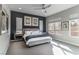 Comfortable main bedroom with a ceiling fan, carpet, and gray walls at 4269 Solace St # 0, Las Vegas, NV 89135