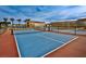 Well-maintained tennis court set amidst a lush, landscaped community at 4269 Solace St # 0, Las Vegas, NV 89135