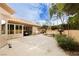 Home featuring covered patio, a fountain, and an outdoor playhouse, perfect for families at 4401 Inez Dr, Las Vegas, NV 89130