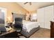 Bright bedroom features vaulted ceilings, neutral colors, and a functional workspace area at 4401 Inez Dr, Las Vegas, NV 89130