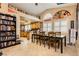 Open kitchen and dining area filled with personal touches and bright natural light at 4401 Inez Dr, Las Vegas, NV 89130