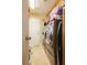 Convenient laundry room features modern washer/dryer and ample storage space at 4401 Inez Dr, Las Vegas, NV 89130