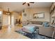Open living room features tile flooring, ceiling fan and comfortable furniture at 4401 Inez Dr, Las Vegas, NV 89130