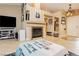 Neutral living room with tile fireplace, high ceilings and lots of decor at 4401 Inez Dr, Las Vegas, NV 89130