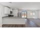 Modern kitchen with white cabinets, stainless steel appliances, and an island at 4922 Canna Lily St, Las Vegas, NV 89122