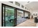 Spacious backyard with patio, seating area, and fire pit at 5219 Iron River Ct, Las Vegas, NV 89135