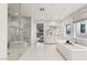Spa-like bathroom with walk-in shower and soaking tub at 5219 Iron River Ct, Las Vegas, NV 89135