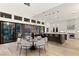 Modern kitchen with island, breakfast bar and access to backyard at 5219 Iron River Ct, Las Vegas, NV 89135